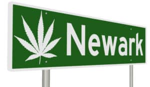 Newark road sign with a picture of a marijuana leaf - New Jersey Cannabis Legalization