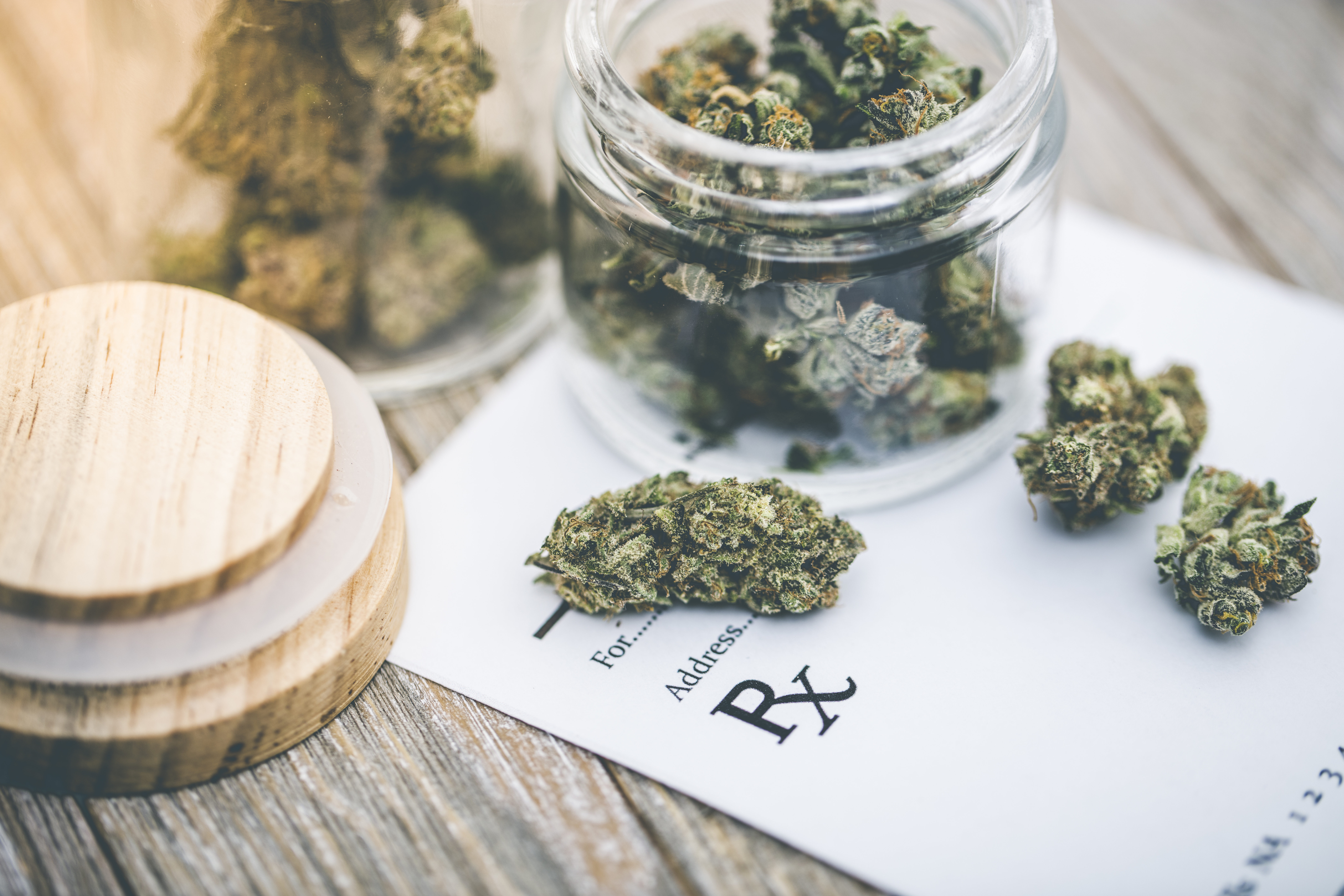 jars of marijuana on a prescription pad - Mississippi medical marijuana